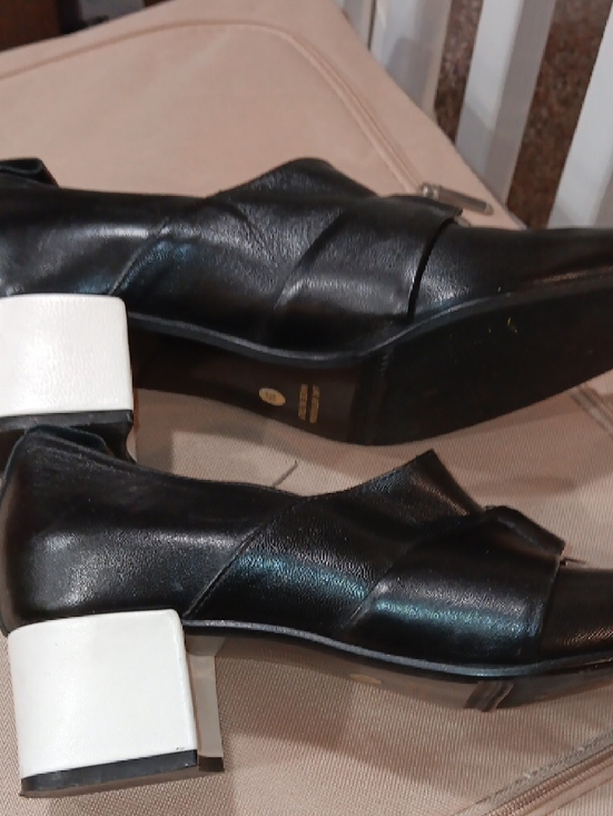 Carel Etienne Deroux Black Leather Slip-On Loafers with Silver Ring Accent